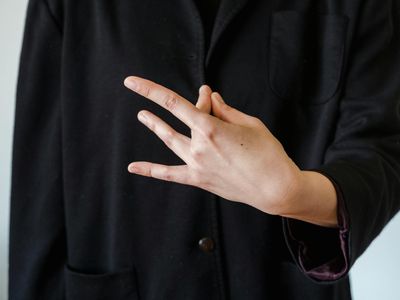 Close up of a person hands in mudra position.
